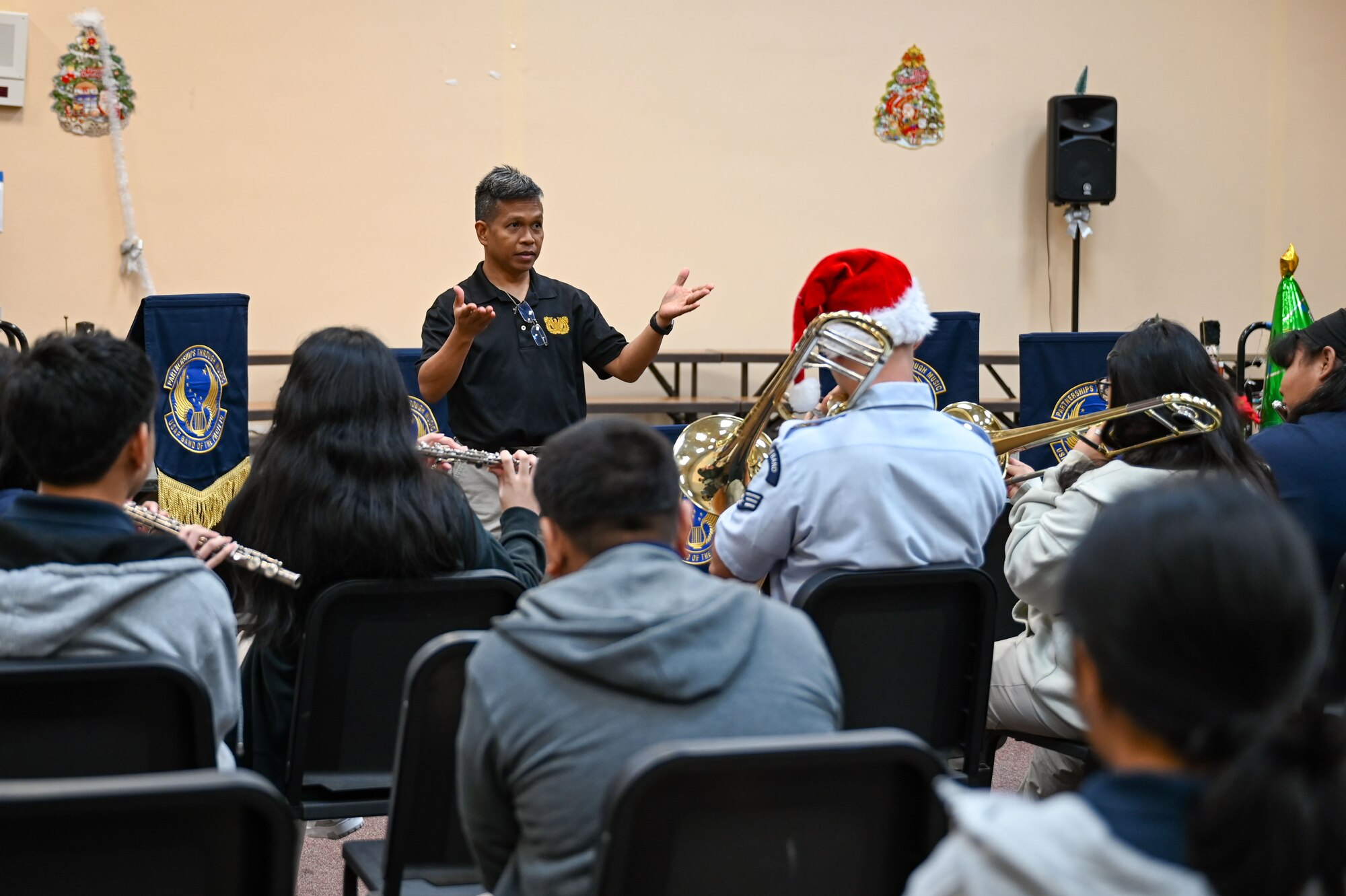 The Pacific Brass Quintet visited schools in Guam, Saipan and Tinian during the 73rd Operation Christmas Drop exercise on Andersen Air Force Base. (U.S. Air Force photo by Airman 1st Class Natasha Ninete)