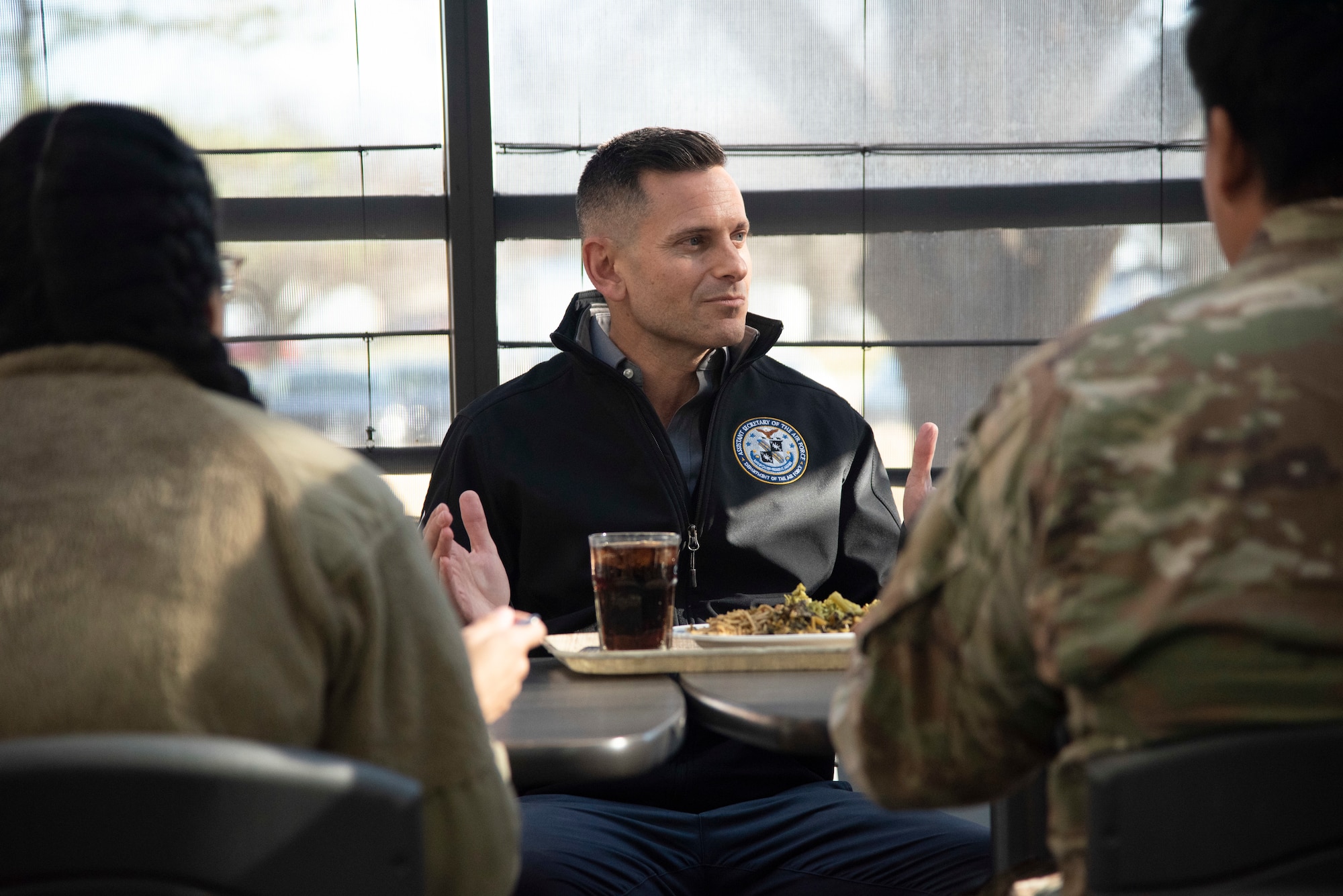 The Honorable Alex Wagner, assistant secretary of the Air Force for Manpower and Reserve Affairs, has lunch with U.S. Airmen.