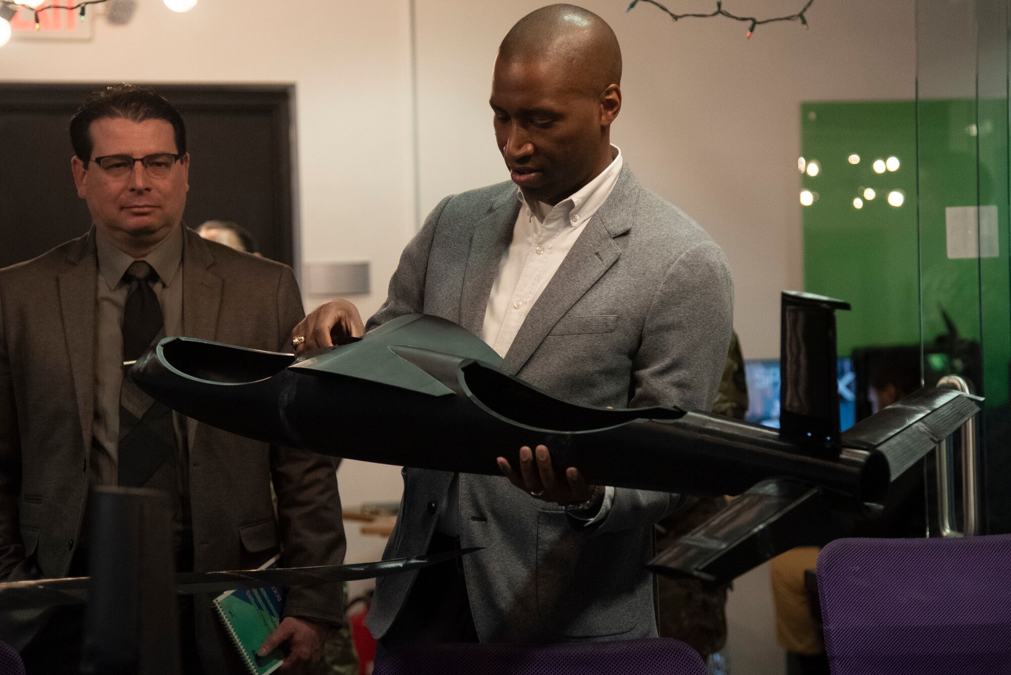 Anthony Woods, secretary of the Maryland Department of Veterans and Military Families, analyzes a 3D-printed panel from an unmanned aerial vehicle at the Spark X Cell Innovation and Idea Center.