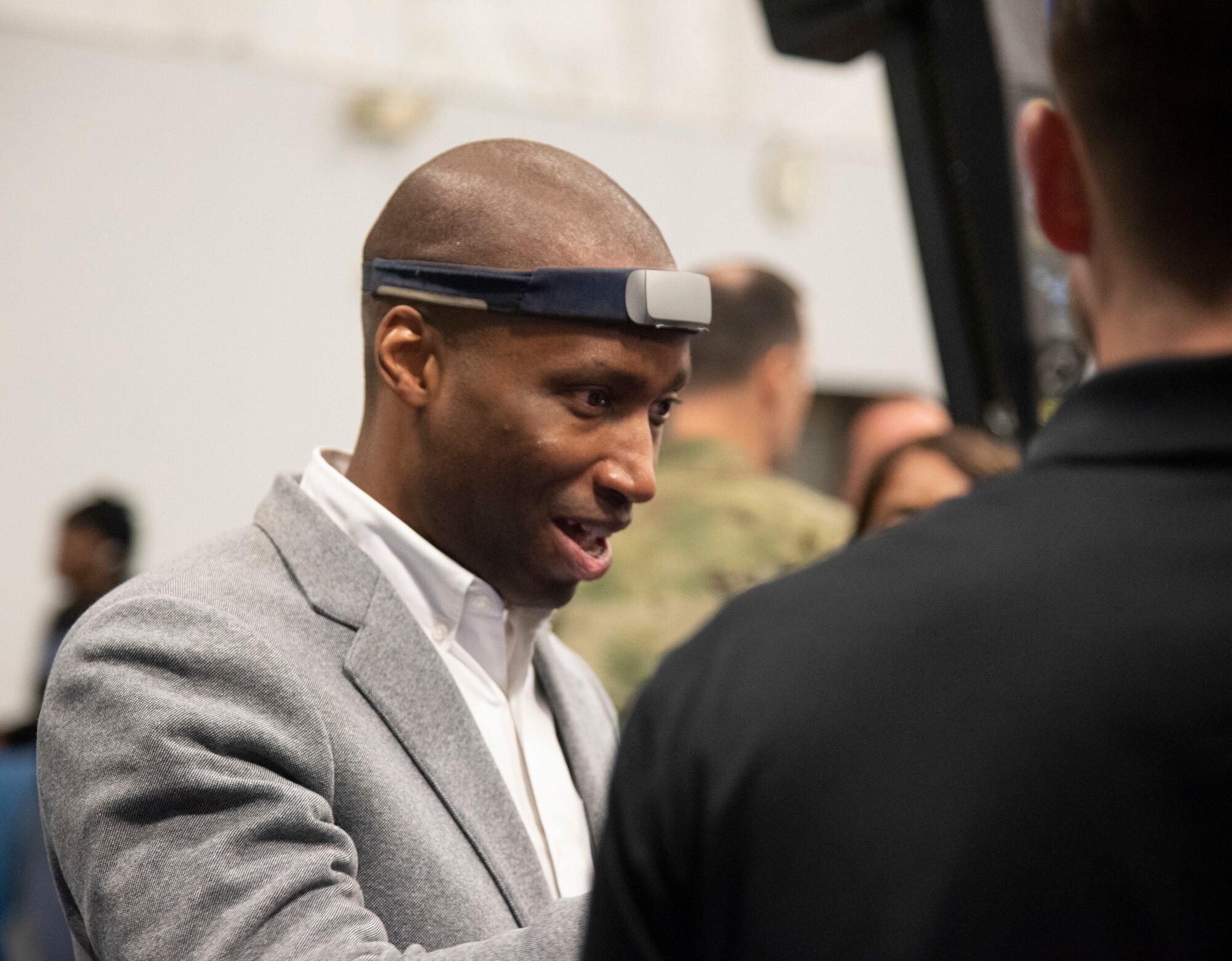 Anthony Woods, secretary of the Maryland Department of Veterans and Military Families, equips himself with a sensory device before a session in the Lumena MindGym.