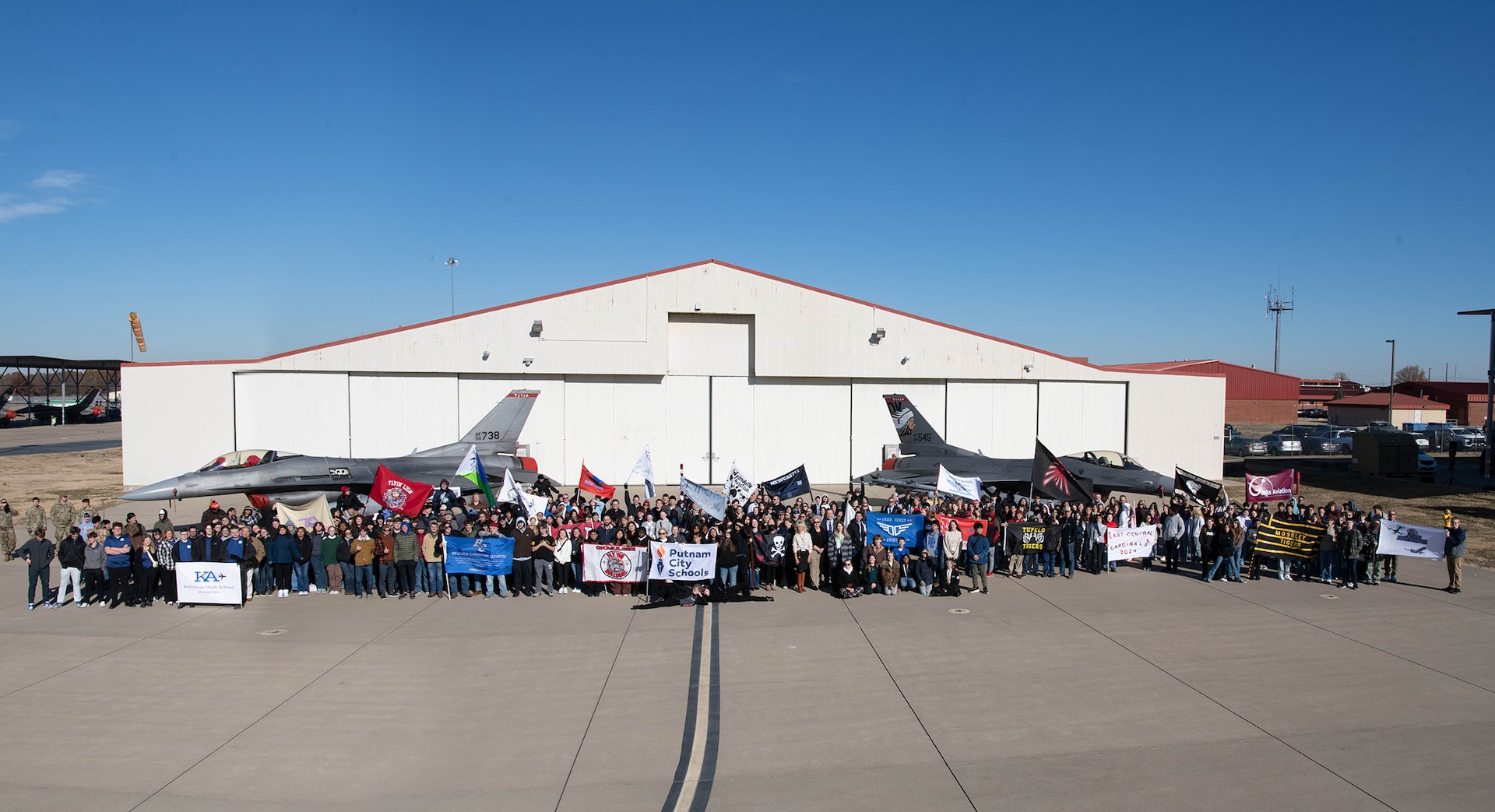 Students from schools across the state gathered at the eighth annual Oklahoma Women in Aviation & Aerospace Day at the Tulsa Air National Guard Base, Okla., Dec. 6, 2023. More than 1,000 students and adults in the aerospace industry came to participate in the event which included aircraft and military static displays, a panel discussion, guest speakers, and more. (Oklahoma Air National Guard photo by Master Sgt. Rebecca Imwalle)