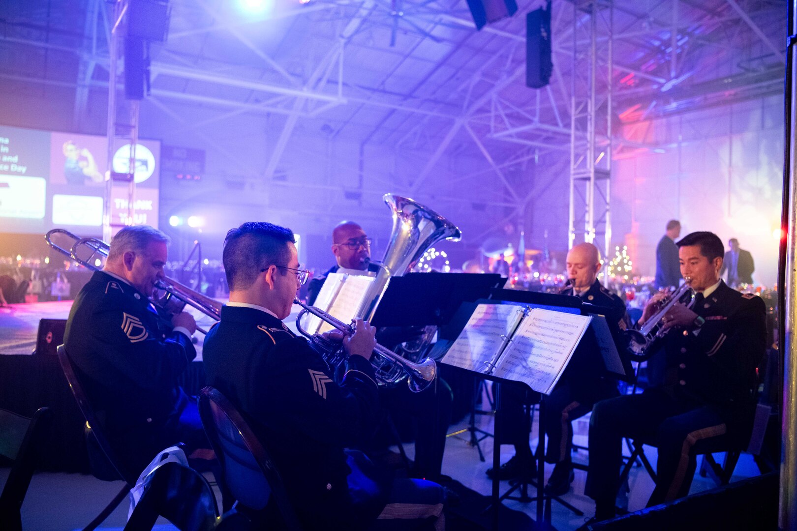 The Oklahoma National Guard's 145th Army Band performs at the eighth annual Oklahoma Women in Aviation & Aerospace Day at the Tulsa Air National Guard Base, Okla., Dec. 6, 2023. More than 1,000 students and adults in the aerospace industry came to participate in the event which included aircraft and military static displays, a panel discussion, guest speakers, and more. (Oklahoma Air National Guard photo by Master Sgt. Rebecca Imwalle)