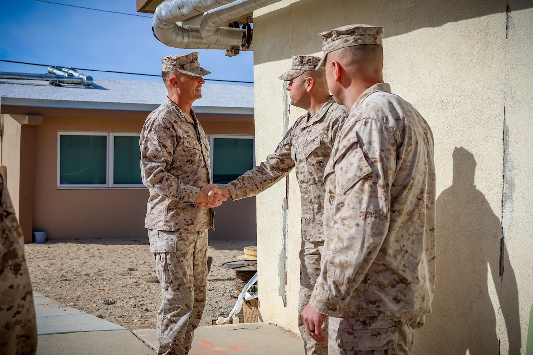 U.S. Marine Corps Lt. Gen. Leonard F. Anderson IV, Duluth, Minnesota native, commander of Marine Forces Reserve and Marine Forces South, greets leadership with 2nd Battalion, 23rd Marine Regiment, 4th Marine Division, during an adversarial force exercise at Marine Air Ground Combat Center, Twentynine Palms, California, Dec. 2, 2024. Anderson met with leadership to discuss the unit’s upcoming deployment to Okinawa, Japan, in support of the Marine Corps’ Unit Deployment Program. This marks the first time since 2020 an entire Reserve infantry battalion has been activated to support the UDP. (U.S. Marine Corps photo by Cpl. Madisyn Paschal)