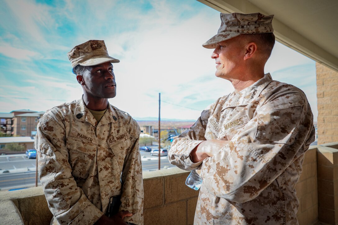 U.S. Marine Corps Lt. Gen. Leonard F. Anderson IV, right, Duluth, Minnesota native, commander of Marine Forces Reserve and Marine Forces South, speaks with Gunnery Sgt. Antione Parker, left, Houston, Texas native, logistics chief with H&S Company, 2nd Battalion, 23rd Marine Regiment, 4th Marine Division, during an adversarial force exercise at Marine Air Ground Combat Center, Twentynine Palms, California, Dec. 2, 2024. Anderson met with leadership to discuss the unit’s upcoming deployment to Okinawa, Japan, in support of the Marine Corps’ Unit Deployment Program. MFR will support the UDP with the battalion by utilizing Total Force solutions to enhance readiness and ensure alignment with Marine Forces Reserve’s commitment to the Marine Corps’ strategic objectives. (U.S. Marine Corps photo by Cpl. Madisyn Paschal)
