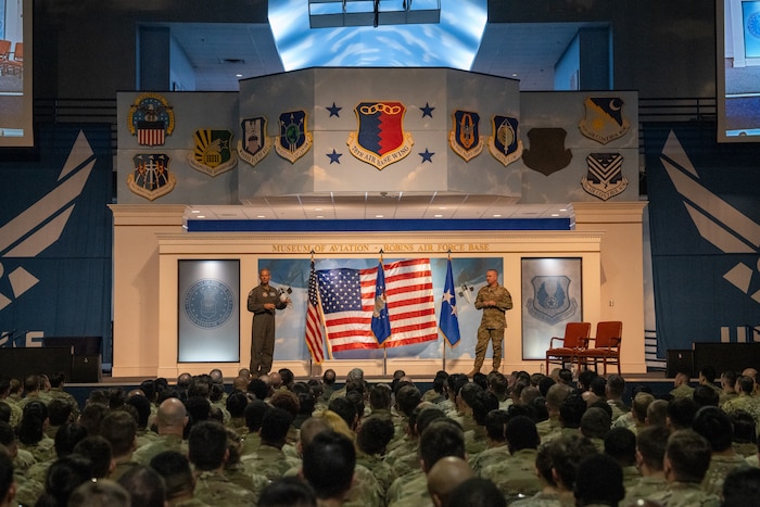 Gen. Ken Wilsbach, commander of Air Combat Command, and U.S. Air Force Chief Master Sgt. Dave Wolfe, ACC command chief, speak to ACC Airmen during an all call