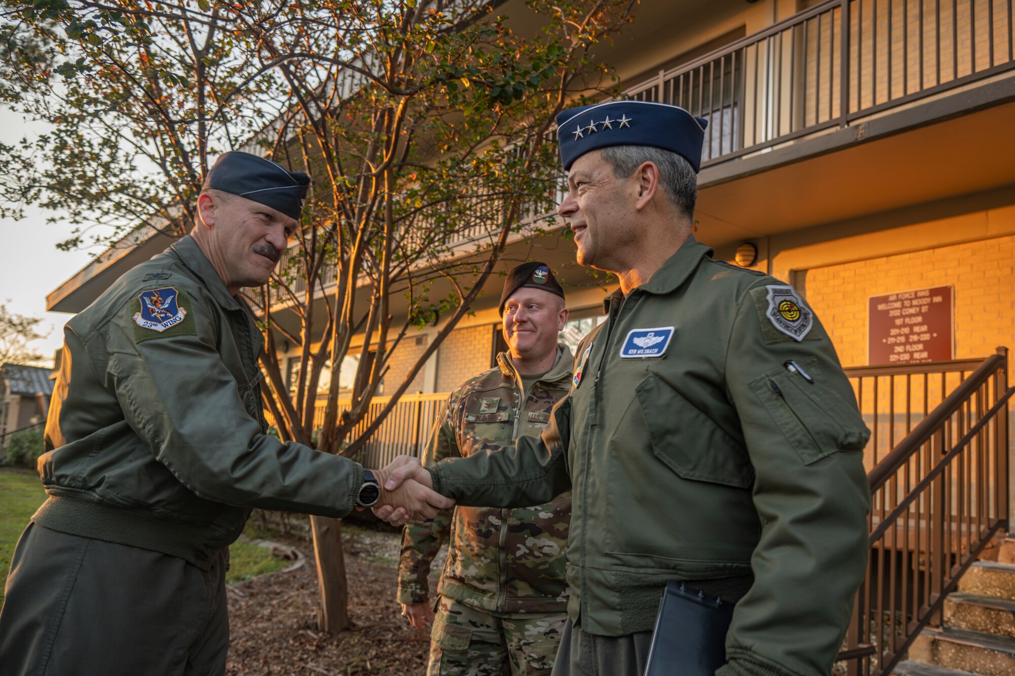 U.S. Air Force Col. Ben Rudolphi, 23rd Wing acting commander, greets Gen. Ken Wilsbach,