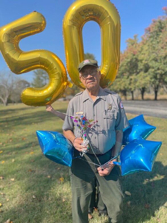The staff at Dale Hollow Lake celebrates Park Ranger Bobby Bartlett’s half century of service to the U.S. Army Corps of Engineers Nashville District near the Resource Manager’s Office Oct. 29, 2024, in Celina, Tennessee. He began working for the Corps of Engineers in 1985 and has since held multiple positions as a park host, maintenance worker, park technician, and park ranger. (USACE Photo by Crystal Tingle)