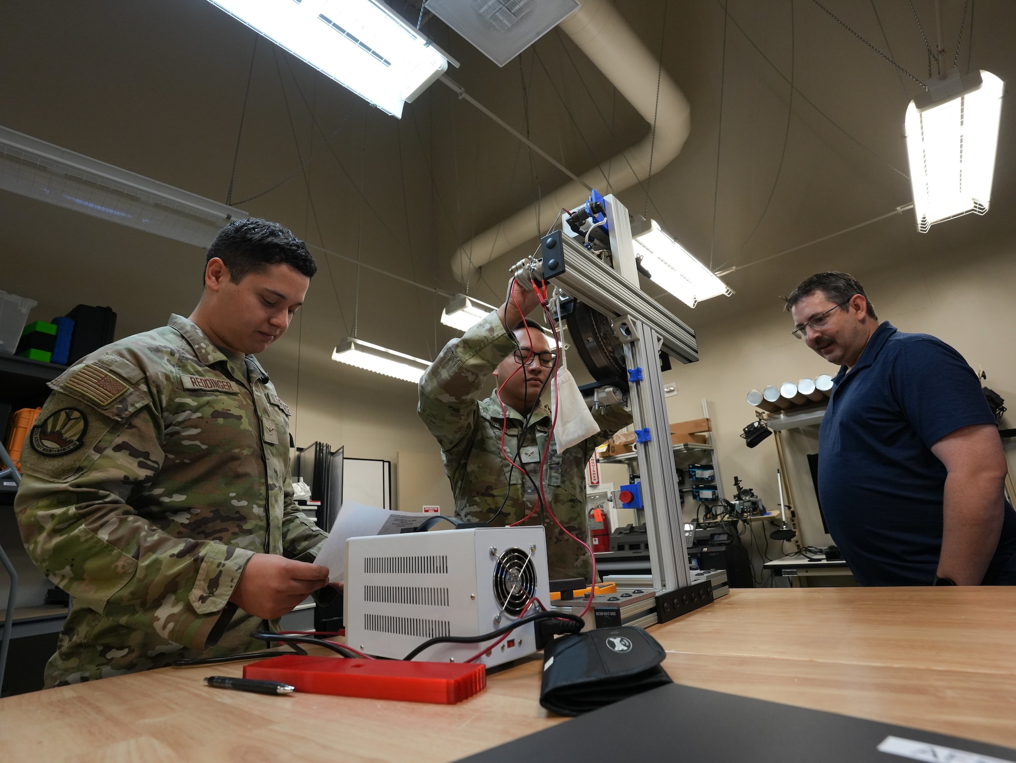 Airmen participate in a 3D printer course.