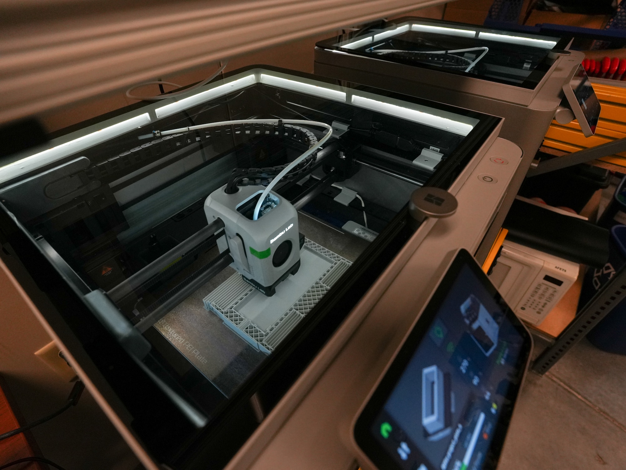 A 3D printer operates.