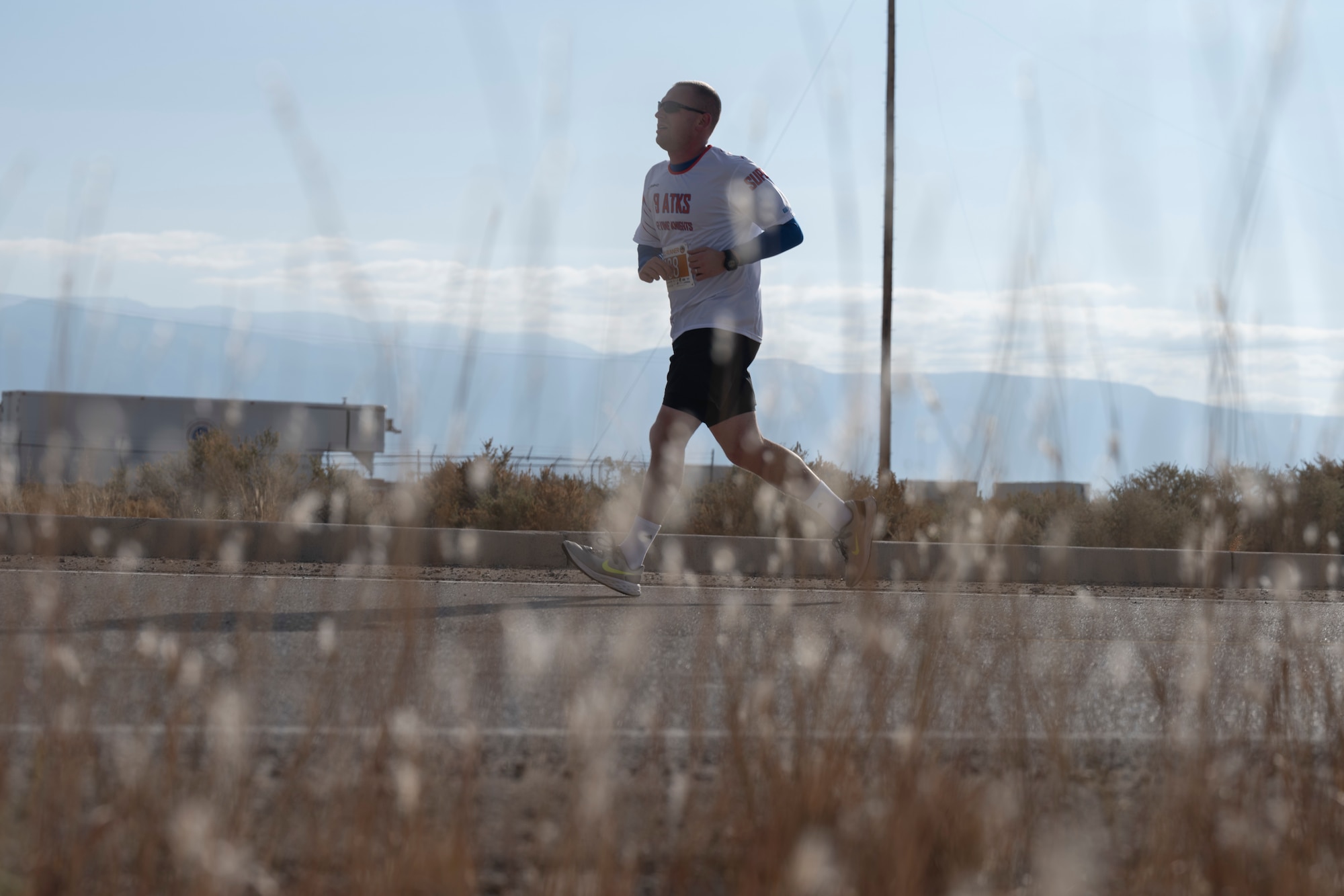 A participant runs during the 2nd annual Ace of Races Marathon at Holloman Air Force Base, New Mexico, Dec. 7, 2024. More than 250 people from across the country participated in the race, which was broken up into a full and half marathon and a 5K. (U.S. Air Force photo by Amn. Elijah Strickland)