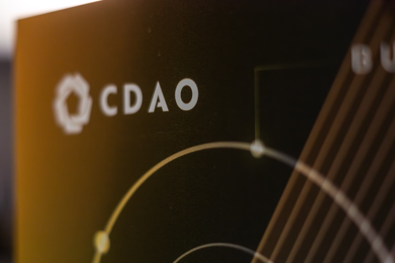 A graphic displays the letters CDAO.