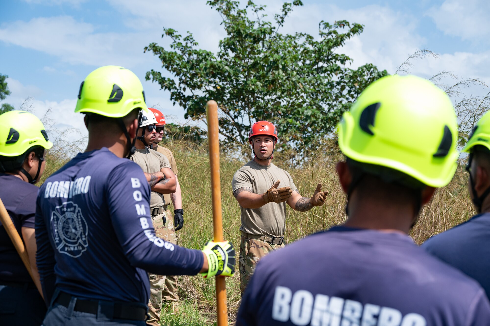 U.S. Air Force Tech. Sgt Justin Rico, Joint Task Force-Bravo firefighter, teaches Panama firefighters how to properly make a fire line during a training exercise in Chepo, Panama, Dec. 10, 2024.