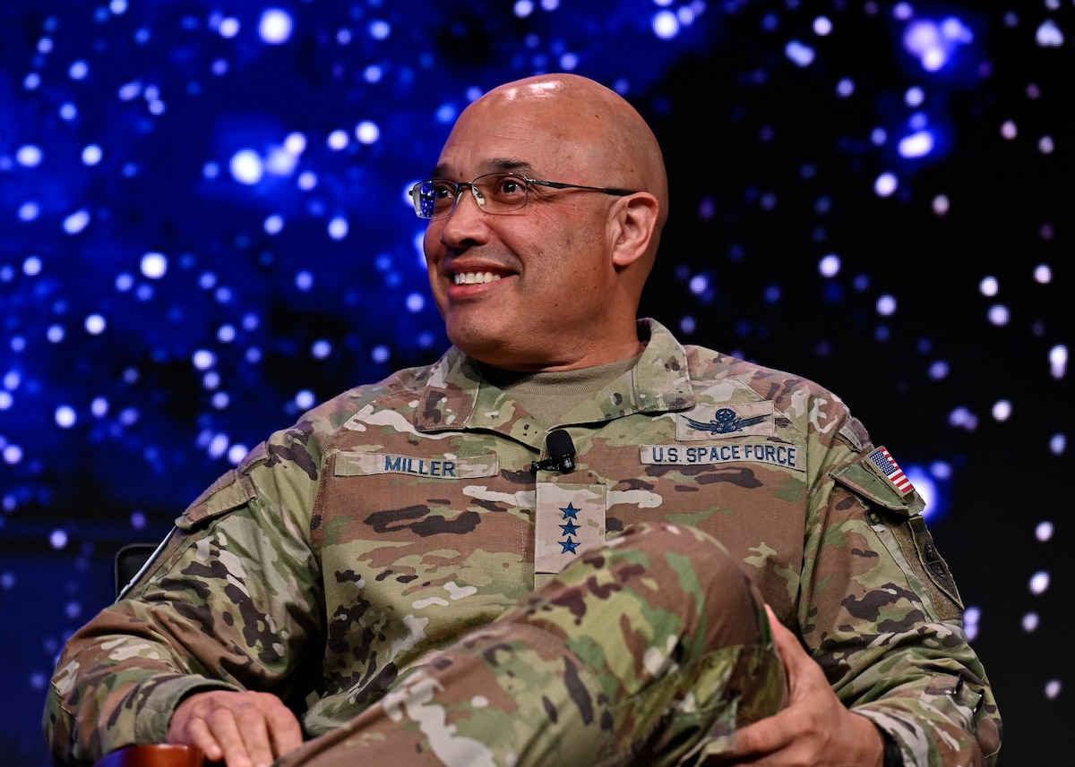 Military member speaks on a panel.
