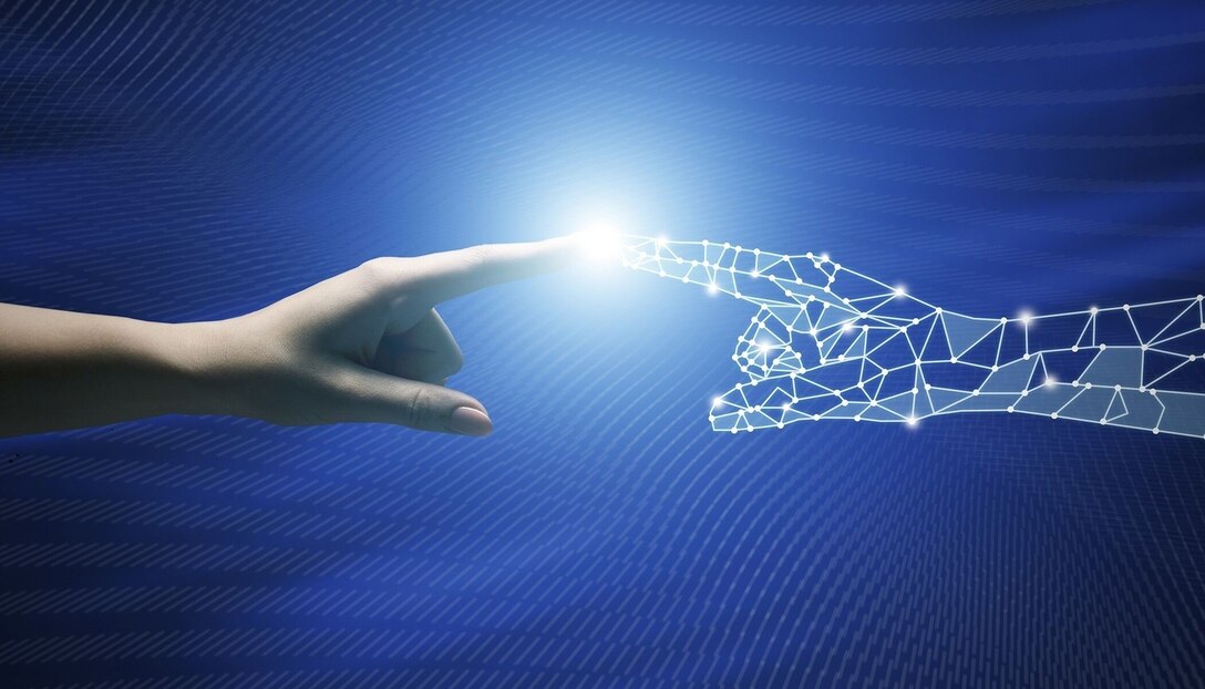 Two hands touch in a photo illustration.