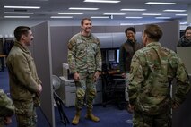U.S. Air Force 1st Lt. William Williams, 35th Contracting Squadron construction flight officer in charge, explains the daily processes to 35th Fighter Wing leadership during a Wild Weasel Walk-through