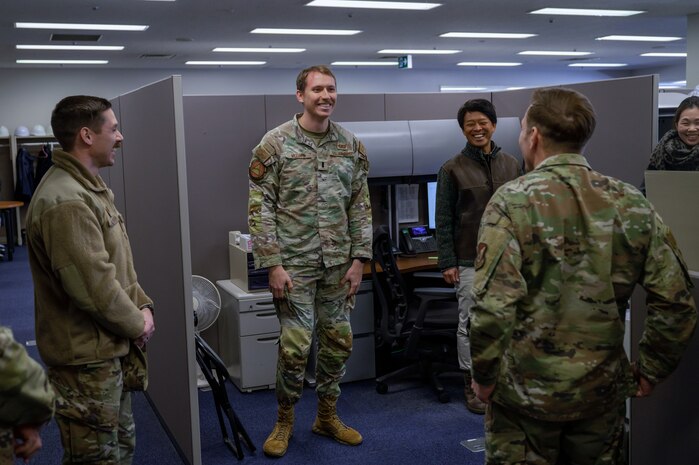 U.S. Air Force 1st Lt. William Williams, 35th Contracting Squadron construction flight officer in charge, explains the daily processes to 35th Fighter Wing leadership during a Wild Weasel Walk-through