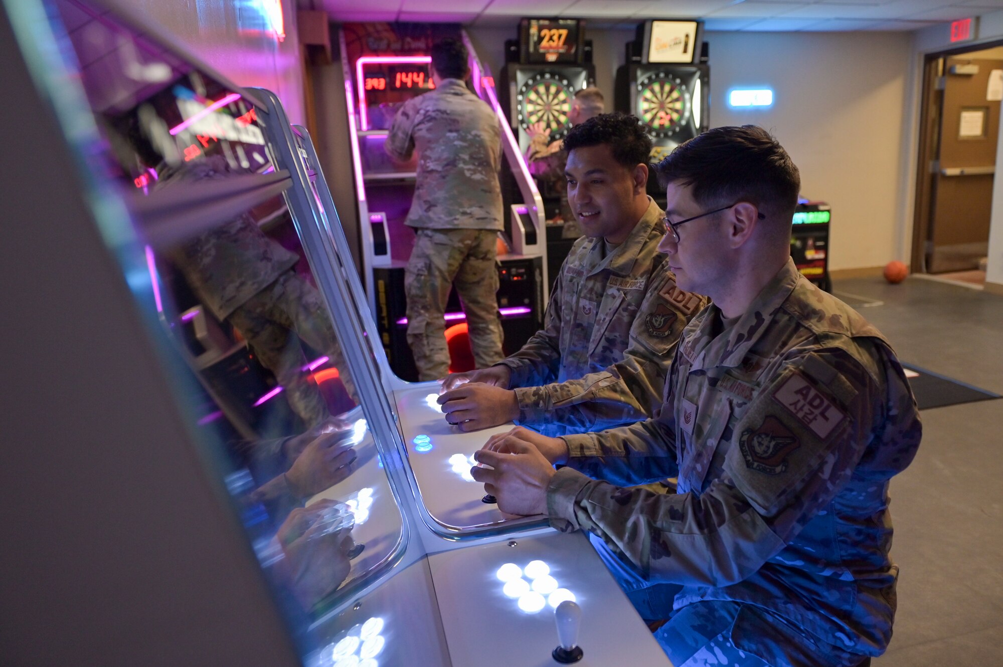 8th Civil Engineer Squadron Airman Dorm Leaders use gaming equipment in a newly renovated dormitory day room at Kunsan Air Base, Republic of Korea.