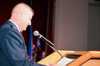 Lt. Col. Jeremy A. Patrick speaks during his assumption of command ceremony at Joint Base San Antonio-Lackland, Texas, Dec. 7, 2024, where he assumes command of the 433rd Operations Group.