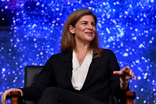  Space Force civilian speaks on a panel.