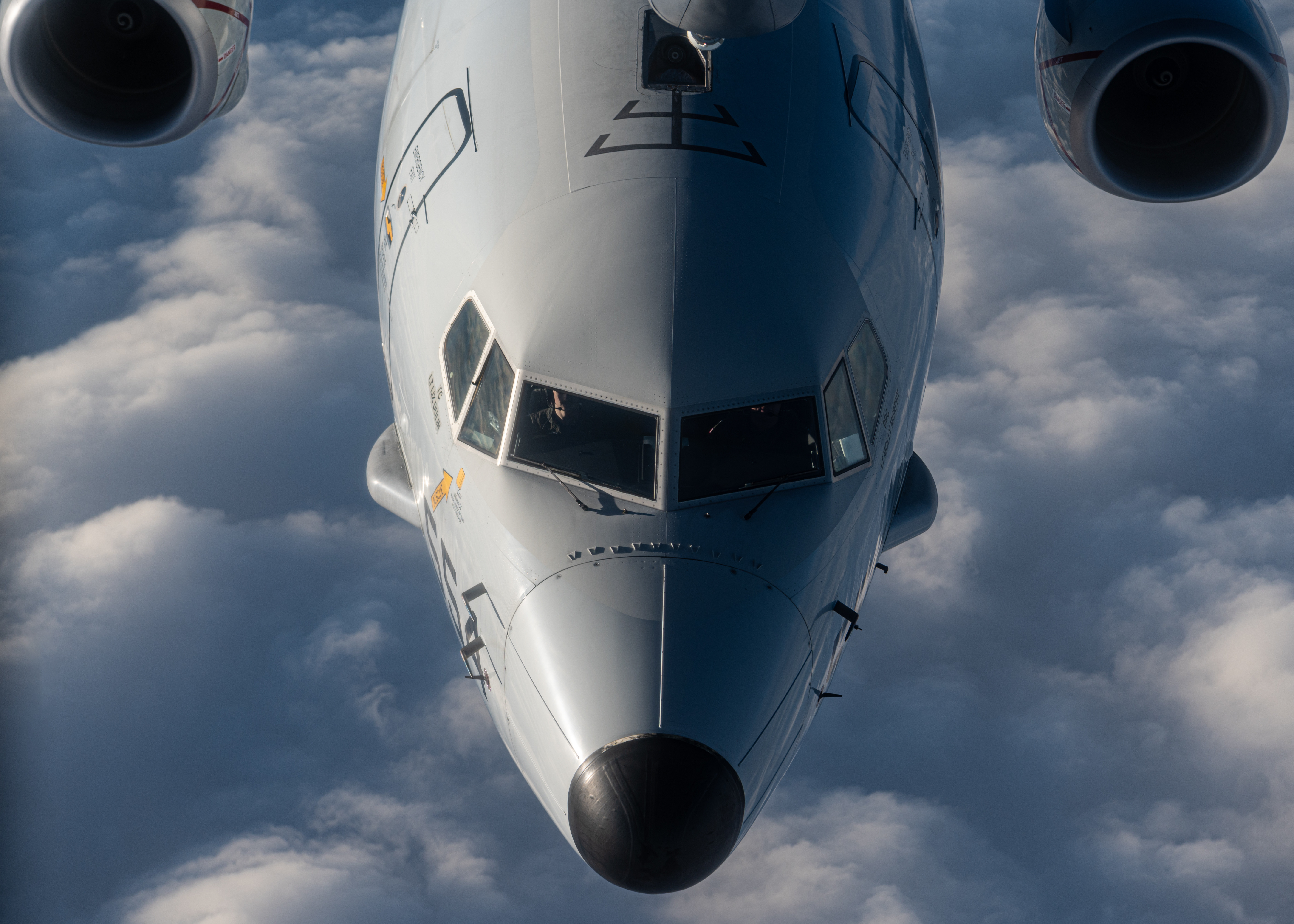 A U.S. Air Force KC-135 Stratotanker assigned to the 351st Air Refueling Squadron refuels a U.S. Navy P-8 Poseidon over Romania, Dec. 9, 2024.