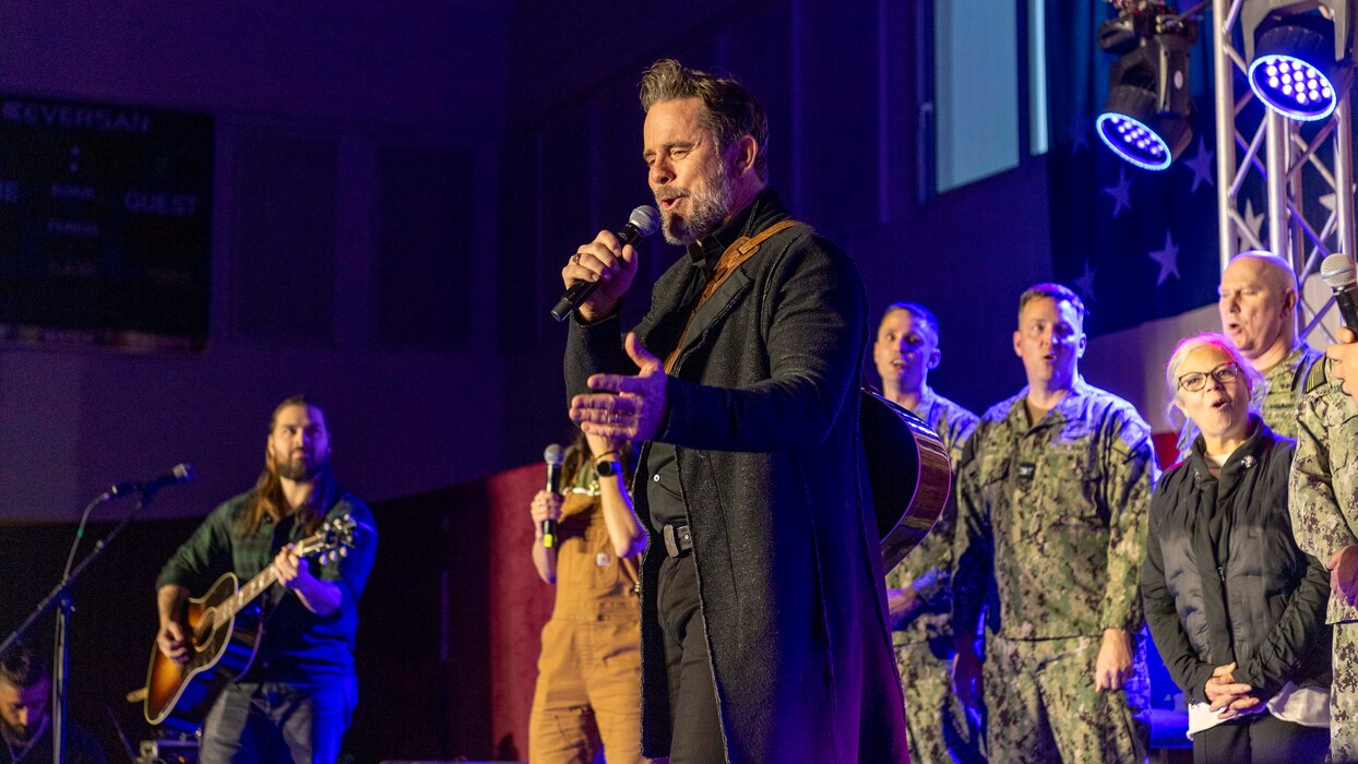 Charles Esten, actor and singer, performs during the United Service Organization (USO) Holiday Tour Live onboard Naval Support Activity (NSA) Souda Bay, Greece, Dec. 11 2024.