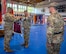 U.S. Army Col. Tracy Michael, commander (left) and Command Sgt. Maj. Kyle S. Brunell, senior enlisted advisor (right), both with the 68th Theater Medical Command, uncasing the unit flag for the first time during the activation ceremony, Sep. 20, 2024 at Sembach, Germany. The role of the 68th Theater Medical Command is to coordinate, integrate, and synchronize medical support across the Europe and Africa theaters. (U.S. Army Photo by Elisabeth Paqué)
