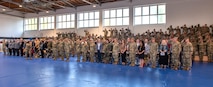 U.S. Soldiers, civilians, families and friends of the 68th Theater Medical Command, render honors during the activation ceremony, Sep. 20, 2024 at Sembach, Germany. The role of the 68th Theater Medical Command is to coordinate, integrate, and synchronize medical support across the Europe and Africa theaters. (U.S. Army Photo by Elisabeth Paqué)