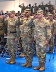 From left to right:  U.S. Army Europe and Africa Lt. Gen. Sean C. Bernabe, Deputy Commanding General, Col. Tracy Michael, commander and Command Sgt. Kyle Brunell, senior enlisted advisor, both with the 68th Theater Medical Command, render honors during the activation ceremony, Sep. 20, 2024 at Sembach, Germany. The role of the 68th Theater Medical Command is to coordinate, integrate, and synchronize medical support across the Europe and Africa theaters. (U.S. Army Photo by Elisabeth Paqué)