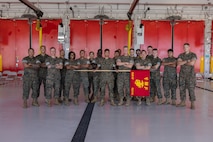 U.S. Marines of Combat Logistics Company-34, 3rd Marine Logistics Group, pose for a photo with Brig. Gen. Kevin G. Collins, commanding general, 3rd MLG, and Maj. Inchul Ha, detachment commander, CLC-34, 3rd MLG, following CLC-34’s activation on Marine Corps Base Camp Blaz, Guam, Dec. 12, 2024. CLC-34’s basing in Guam represents a bolstered dispersal of logistics forces that support III MEF exercises and operations across the Indo-Pacific and are positioned to further enable cooperative security partnerships with regional partners and allies. The activation of CLC-34 marks another step in the planned laydown of Marine forces in the Indo-Pacific region aimed at being geographically distributed and operationally resilient, while maintaining readiness and capability during crises, disasters, or conflicts. (U.S. Marine Corps photo by Lance Cpl. Rey Moreno Marilao)