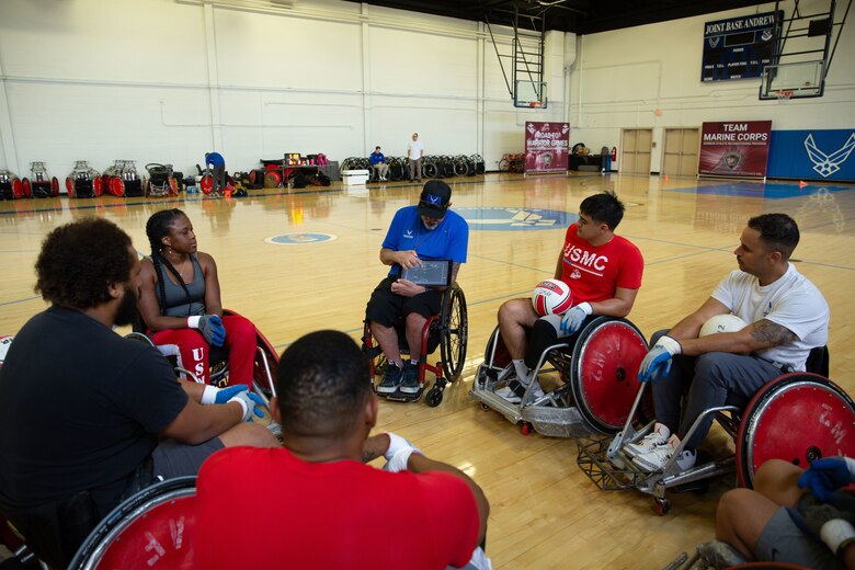 U.S. Marines assigned to Wounded Warrior Regiment study defensive plays for wheelchair rugby during the 2024 Warrior Care Week at Joint Base Andrews, Maryland, Nov. 20, 2024.