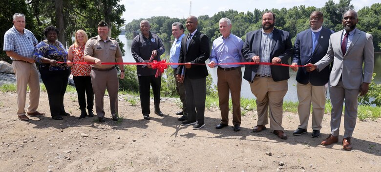 People at ribbon cutting.