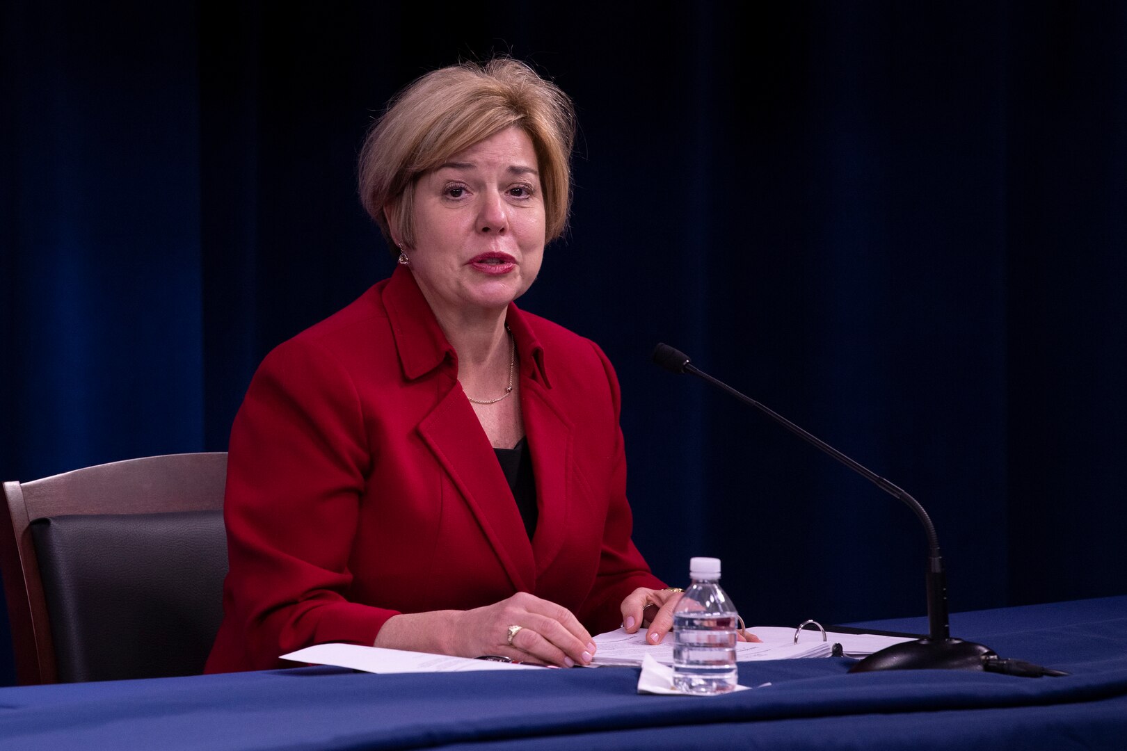 DSCA Director Heidi Grant sits at a table in the Pentagon Press Briefing Room