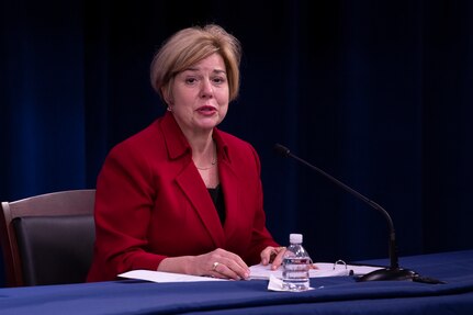 DSCA Director Heidi Grant sits at a table in the Pentagon Press Briefing Room
