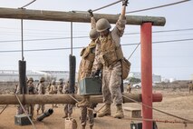 U.S. Marine Corps recruits with Fox Company, 2nd Recruit Training Battalion, navigate an obstacle during the Crucible at Marine Corps Base Camp Pendleton, California, Dec. 3, 2024. The Crucible is a 54-hour exercise where recruits apply the knowledge they learned throughout recruit training to earn the title United States Marine. (U.S. Marine Corps photo by Lance Cpl. Jacob B. Hutchinson)