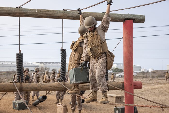 U.S. Marine Corps recruits with Fox Company, 2nd Recruit Training Battalion, navigate an obstacle during the Crucible at Marine Corps Base Camp Pendleton, California, Dec. 3, 2024. The Crucible is a 54-hour exercise where recruits apply the knowledge they learned throughout recruit training to earn the title United States Marine. (U.S. Marine Corps photo by Lance Cpl. Jacob B. Hutchinson)