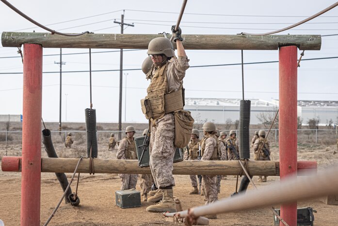 U.S. Marine Corps recruits with Fox Company, 2nd Recruit Training Battalion, navigate an obstacle during the Crucible at Marine Corps Base Camp Pendleton, California, Dec. 3, 2024. The Crucible is a 54-hour exercise where recruits apply the knowledge they learned throughout recruit training to earn the title United States Marine. (U.S. Marine Corps photo by Lance Cpl. Jacob B. Hutchinson)