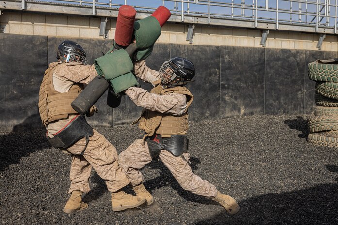 U.S. Marine Corps recruits with Fox Company, 2nd Recruit Training Battalion, execute pugil sticks during the Crucible at Marine Corps Base Camp Pendleton, California, Dec. 3, 2024. The Crucible is a 54-hour exercise where recruits apply the knowledge they learned throughout recruit training to earn the title United States Marine. (U.S. Marine Corps photo by Lance Cpl. Jacob B. Hutchinson)