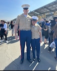 U.S. Marine Corps Staff Sgt. Joseph M. Adams, left, a watch commander with the Marine Corps Air Station Yuma Provost Marshal’s Office, Marine Corps Installations West, and Pfc. Britney Moyeda, hug on graduation day at Marine Corps Recruit Depot San Diego, Calif. October 25, 2024. Adams recruited Moyeda out of Houston, Texas and surprised her on graduation day after he ended his tour as a recruiter. After beating cancer, Moyeda chose to become a Marine, spending over a year waiting to be medically-cleared to enter the delayed entry program. (Courtesy photo by the Moyeda family)