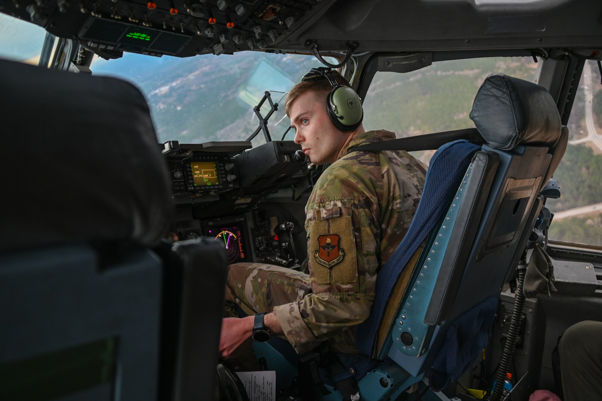 A Air Force pilot flys a icraft.