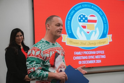 Members of the Oklahoma National Guard Family Program Office are awarded certificates of appreciation from the Florida National Guard Family Program Office for providing remote relief to more than 750 FLNG Soldiers affected by Hurricane Helene by offering resource referral assistance. The support lessened the burden of the Florida National Guard while enabling their Guardsmen to focus on responding to the devastation. (Oklahoma National Guard photo by Staff Sgt. Reece Heck)