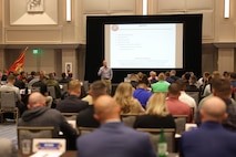 U.S. Marine Corps Col. Darryl Ayers, Officer Candidates School commanding officer, addresses attendees of the Fiscal Year 2025 National Officer Selection Officer Training Symposium in Orlando on Dec. 10, 2024. NOSOTS is designed to conduct training, discuss recruiting topics and issues and recognize those Officer Selection Teams which have distinguished themselves during the previous fiscal year. (U.S. Marine Corps photo by Lance Cpl. Brenna Ritchie)