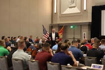 U.S. Marine Corps Col. Robert McCarthy III, The Basic School commanding officer, addresses attendees of the Fiscal Year 2025 National Officer Selection Officer Training Symposium in Orlando on Dec. 10, 2024. NOSOTS is designed to conduct training, discuss recruiting topics and issues and recognize those Officer Selection Teams which have distinguished themselves during the previous fiscal year. (U.S. Marine Corps photo by Lance Cpl. Brenna Ritchie)