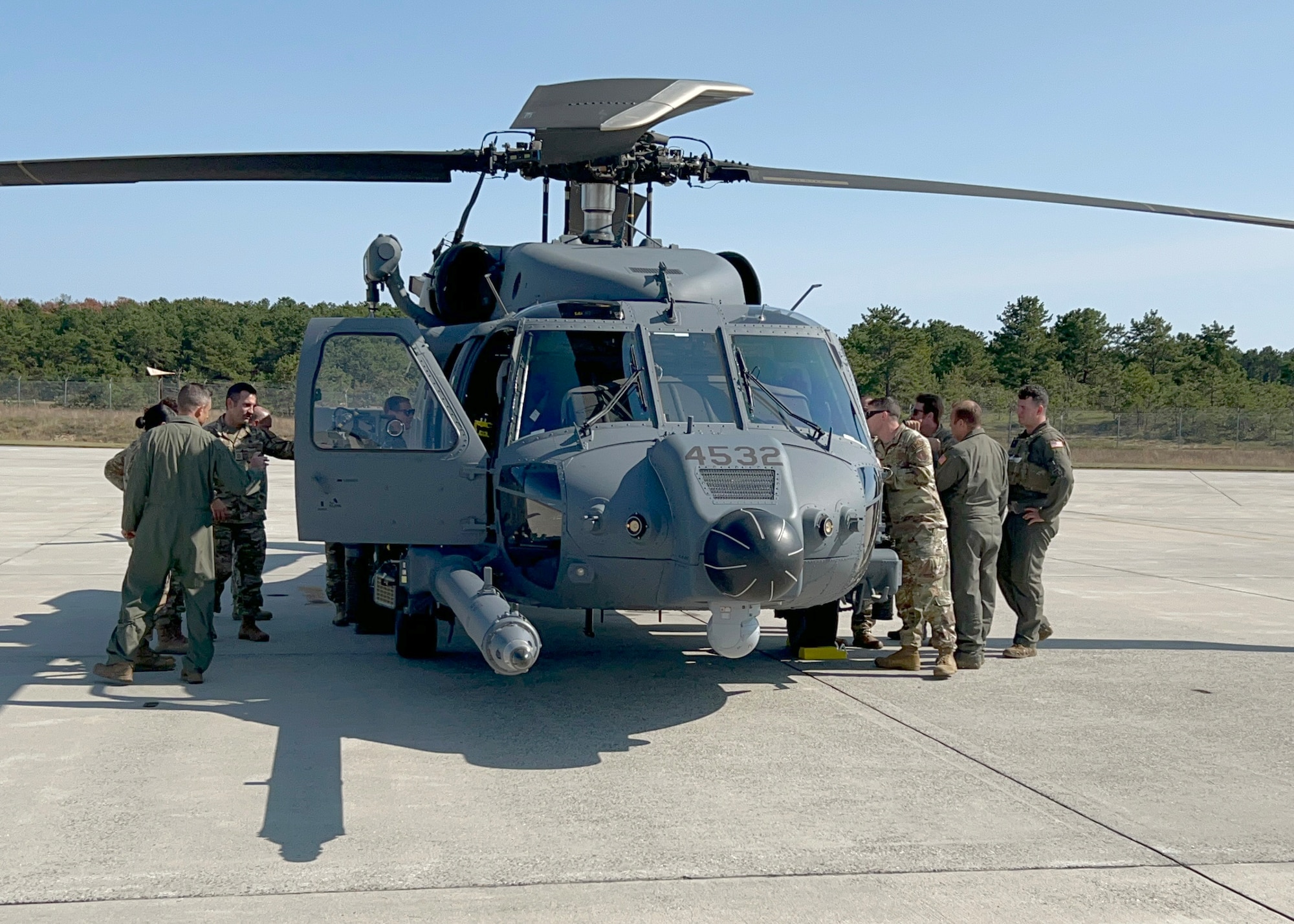 New York Air National Guard Airmen from the 106th Rescue Wing look at the new HH-60W Jolly Green II search and rescue helicopter at Francis S. Gabreski Air National Guard Base, Westhampton Beach, N.Y., Sept. 12, 2024.