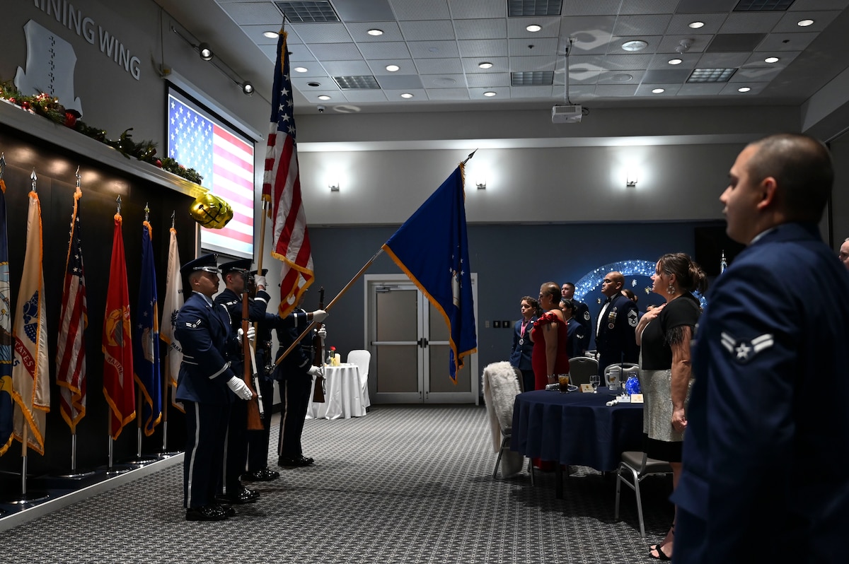 The Goodfellow Air Force Base Honor Guard presents the colors during the Airman Leadership School Class 25-A graduation at the Powell Event Center, Goodfellow Air Force Base, Texas, Dec. 13, 2024. One of the purposes of the Honor Guard is to present the National Colors during official ceremonies. (U.S.Air Force photo by Airman 1st Class Madi Collier)