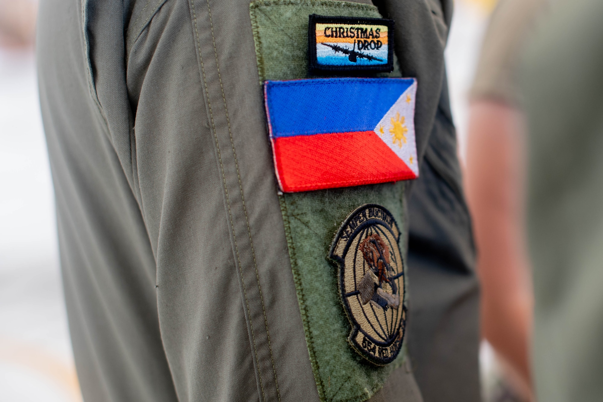 A man displays his patch.