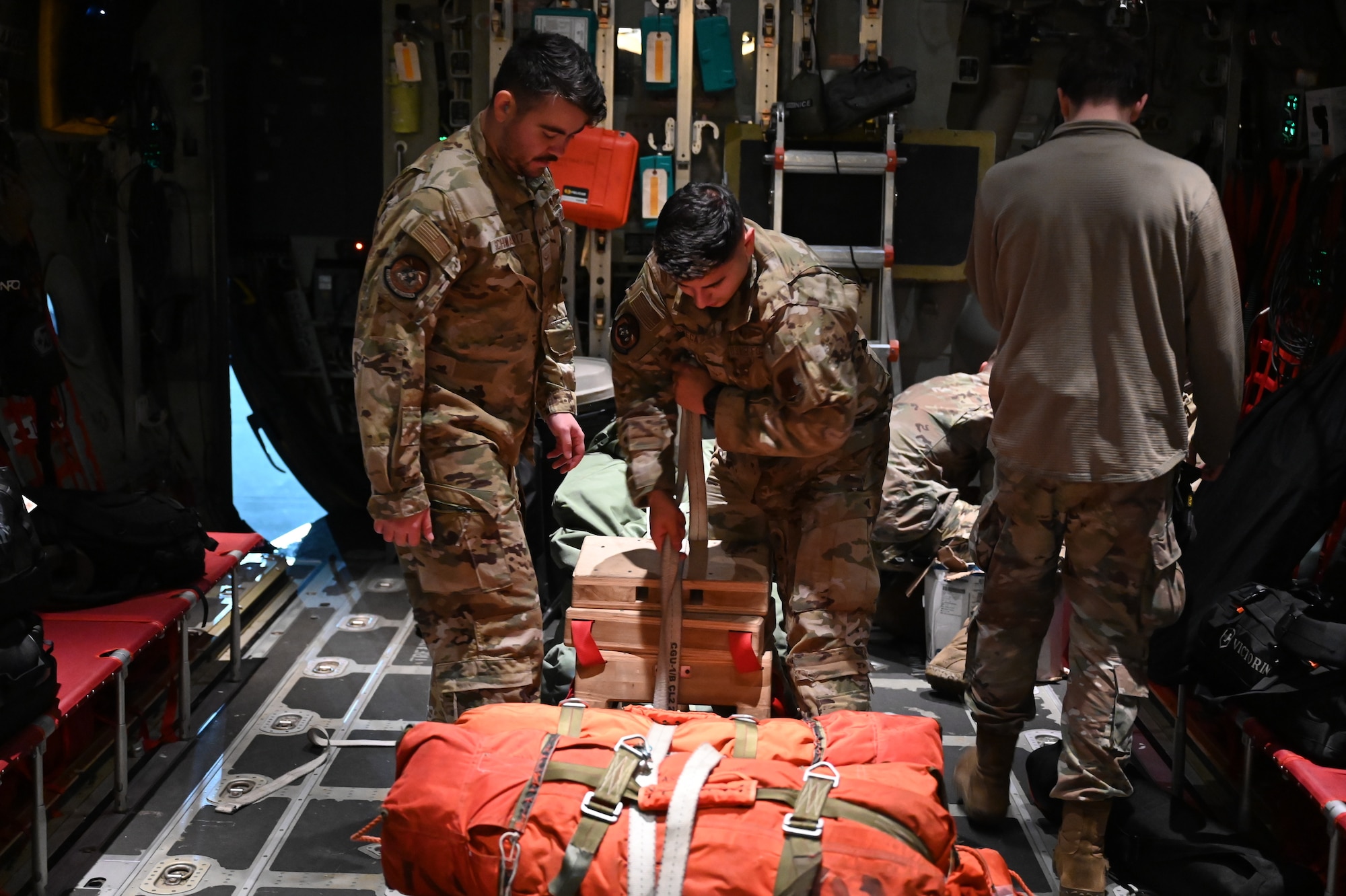 102nd Rescue Squadron loadmasters, assigned to the 106th Rescue Wing, load an HC-130J Combat King II search and rescue aircraft for Hurricane Milton support at Francis S. Gabreski Air National Guard base, Westhampton Beach, N.Y., October 9, 2024.