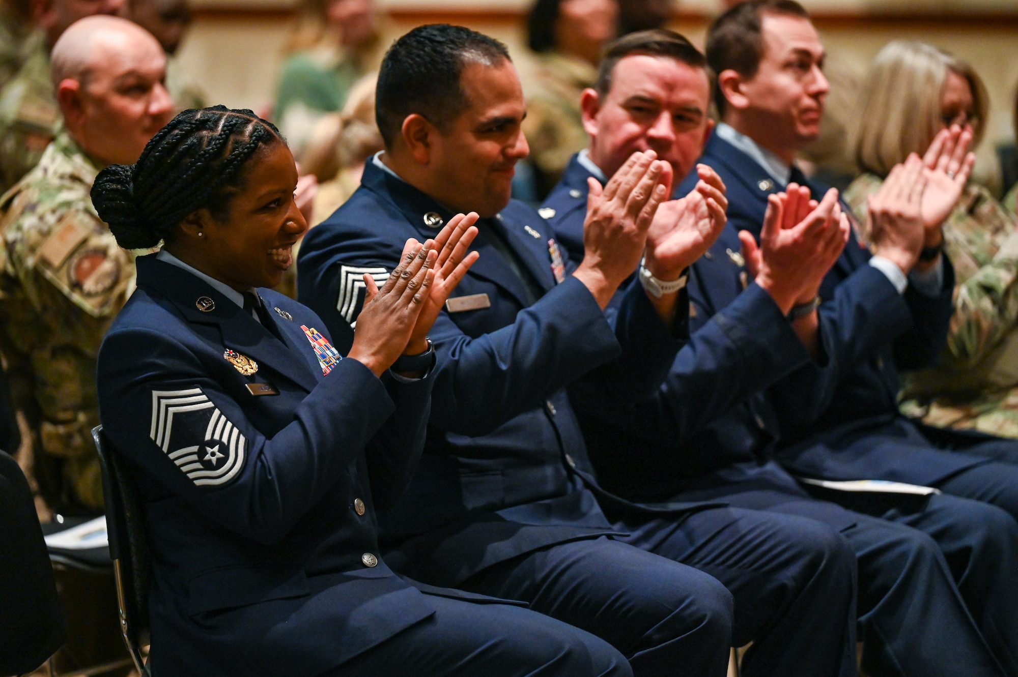U.S. Air Force members applaud