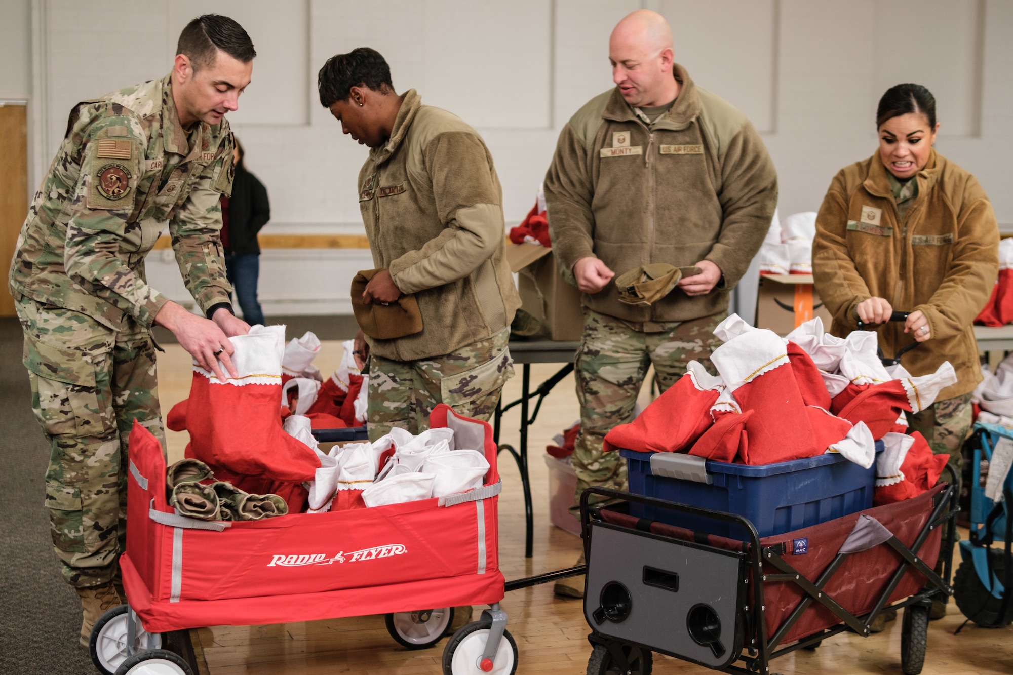 Holloman First Sergeants sort donations prior to the Airmen cookie drive distribution.