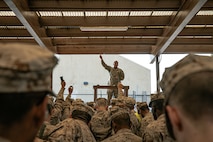 U.S. Marine Corps a Small Arms Repair Technician, Lance Cpl. Maurice Davis, with Headquarters and Service Battalion, Marine Corps Recruit Depot San Diego, instructs recruits with India Company, 3rd Recruit Training Battalion, during a M16A4 service rifle issue at MCRD San Diego, California, Dec. 9, 2024. Recruits will carry their rifles throughout recruit training and will learn how to properly clean and maintain them to help extend the life of the rifles for future recruits. Marines are warfighters first, and always. Every Marine is a rifleman, and Marine officer is a rifle platoon commander. This unique characteristic distinguishes Marines from all Services, at home and abroad. (U.S. Marine Corps photo by Cpl. Sarah M. Grawcock)