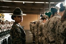 U.S. Marine Corps Drill Instructor, Staff Sgt. Kassandra Luna, with India Company, 3rd Recruit Training Battalion, instructs recruits before for a M16A4 service rifle issue at Marine Corps Recruit Depot San Diego, California, Dec. 9, 2024. Recruits will carry their rifles throughout recruit training and will learn how to properly clean and maintain them to help extend the life of the rifles for future recruits. Marines are warfighters first, and always. Every Marine is a rifleman, and Marine officer is a rifle platoon commander. This unique characteristic distinguishes Marines from all Services, at home and abroad. (U.S. Marine Corps photo by Cpl. Sarah M. Grawcock)